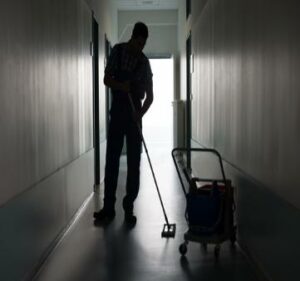 man washing floor